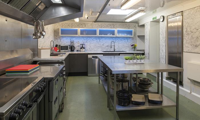 Our fully equipped kitchen with large prep table